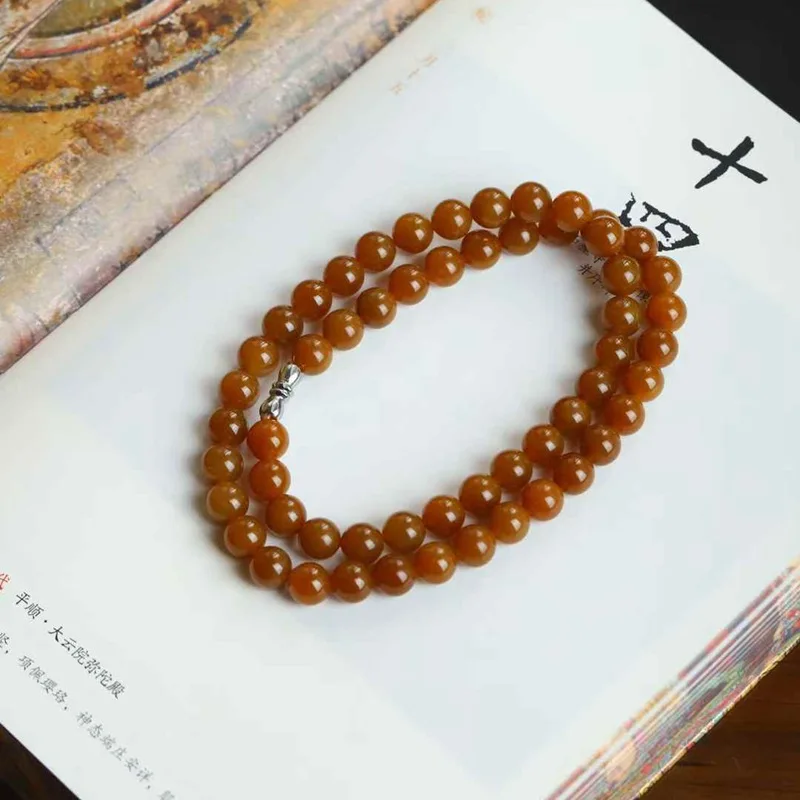Natural Hetian Jade Qiemo Old Material Full Red Sugar Bead Necklace With Certificate
Natural Hetian Jade Qiemo Old Material Full Red Sugar Bead Necklace With Certificate