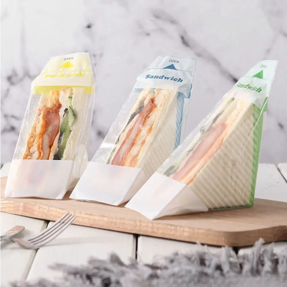 100pcs Plastic Disposable Sandwich Packaging Bag Transparent Triangle Bread Bags Easy To Tear Thicken Sandwich Wrappers Wedding
100pcs Plastic Disposable Sandwich Packaging Bag Transparent Triangle Bread Bags Easy To Tear Thicken Sandwich Wrappers Wedding