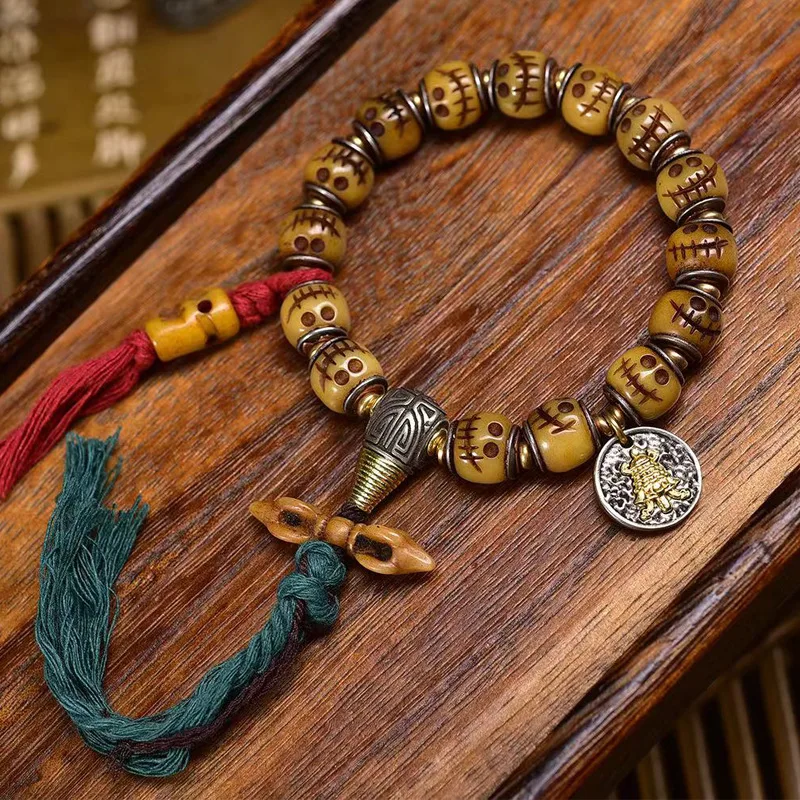 Tibetan-style vintage yak bone carved bracelet with single-loop old silver inlaid barrel , collectible Buddhist beads, vint
Tibetan-style vintage yak bone carved bracelet with single-loop old silver inlaid barrel , collectible Buddhist beads, vint