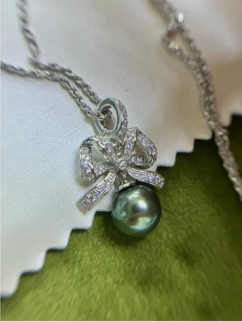 потрясающий кулон с таитянским круглым черным зеленым жемчугом диаметром 10-11 мм, ожерелье 925s
потрясающий кулон с таитянским круглым черным зеленым жемчугом диаметром 10-11 мм, ожерелье 925s