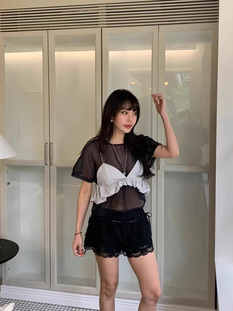 Gagarich Transparent Short Sleeved Shirt Women Summer New Temperament Black Fungus Edge External Suspender Two-piece Set
Gagarich Transparent Short Sleeved Shirt Women Summer New Temperament Black Fungus Edge External Suspender Two-piece Set