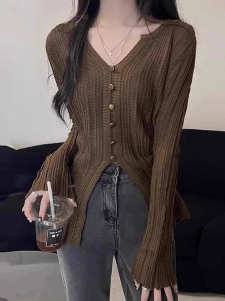 Женский весенний корейский модный вязаный укороченный кардиган в рубчик, свитер с длинными рукавами, однотонный универсальный пуловер на пуговицах спереди
Женский весенний корейский модный вязаный укороченный кардиган в рубчик, свитер с длинными рукавами, однотонный универсальный пуловер на пуговицах спереди
