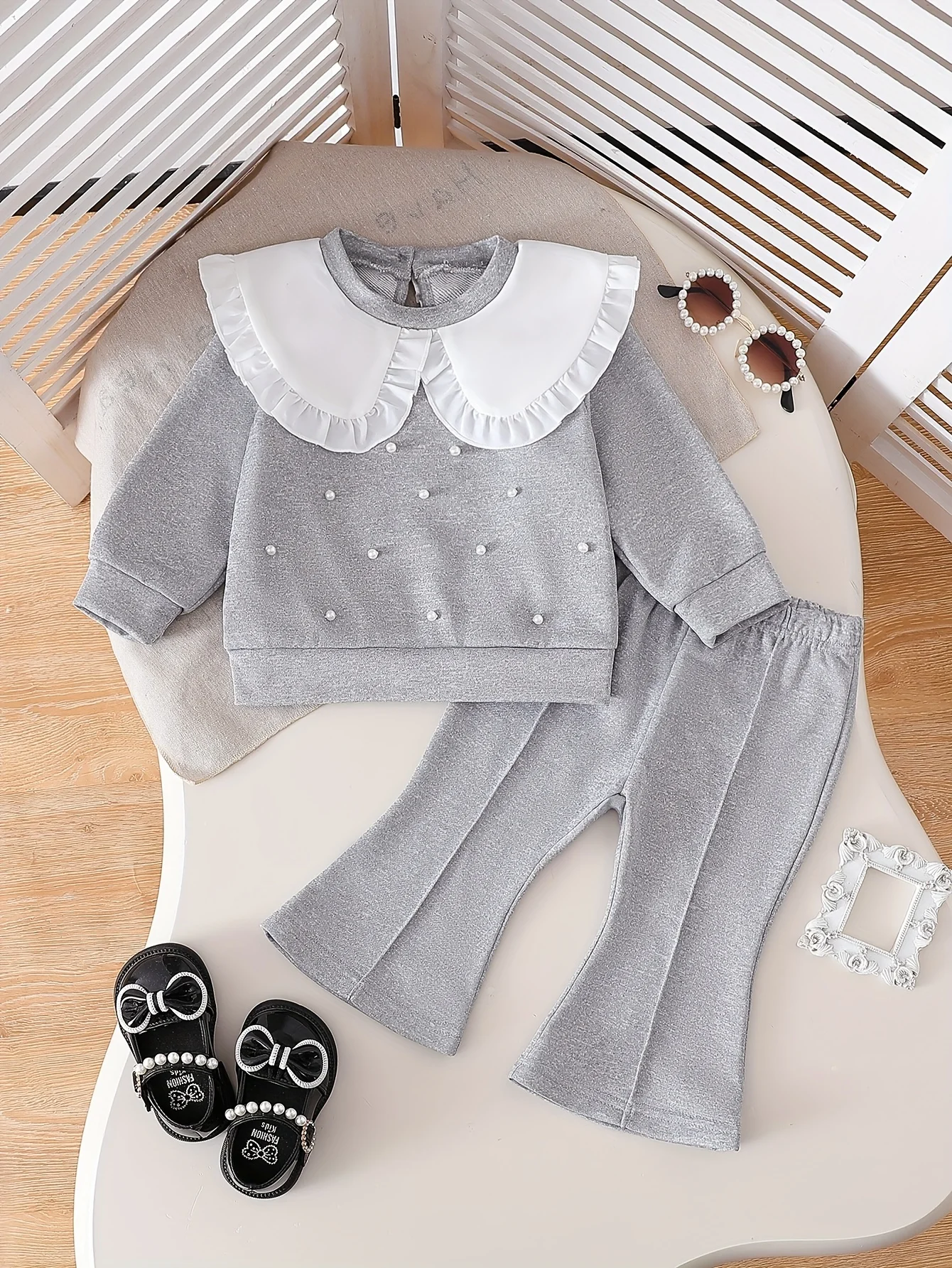 Baby Girl Big Collar Pearl Top & Flared Pants Set: For Outings, Perfect for Birthdays & Valentine’s Gifts
Baby Girl Big Collar Pearl Top & Flared Pants Set: For Outings, Perfect for Birthdays & Valentine’s Gifts
