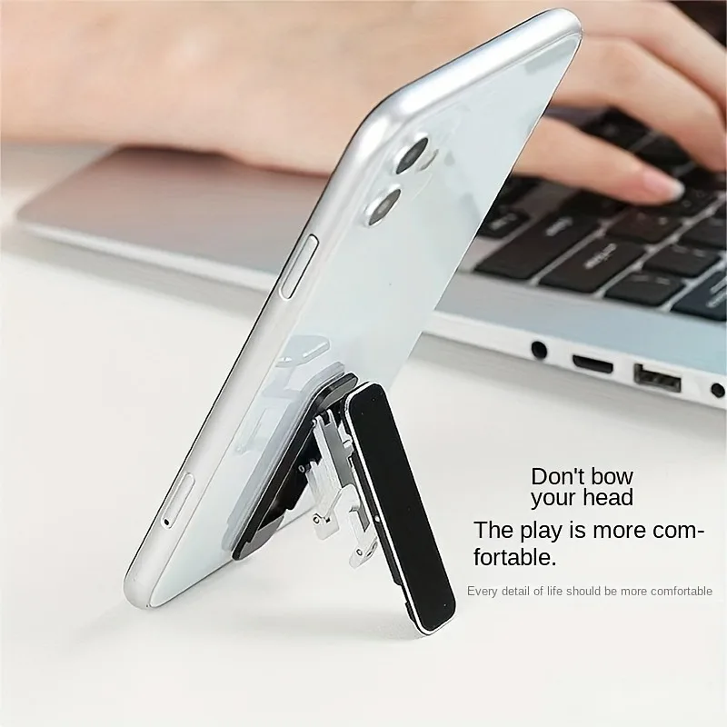 Folding Mini Plastics Phone Holder Silicone Foldable Desktop Stand 360 Rotating Universal Mobile Phone Desk Bracket
Folding Mini Plastics Phone Holder Silicone Foldable Desktop Stand 360 Rotating Universal Mobile Phone Desk Bracket