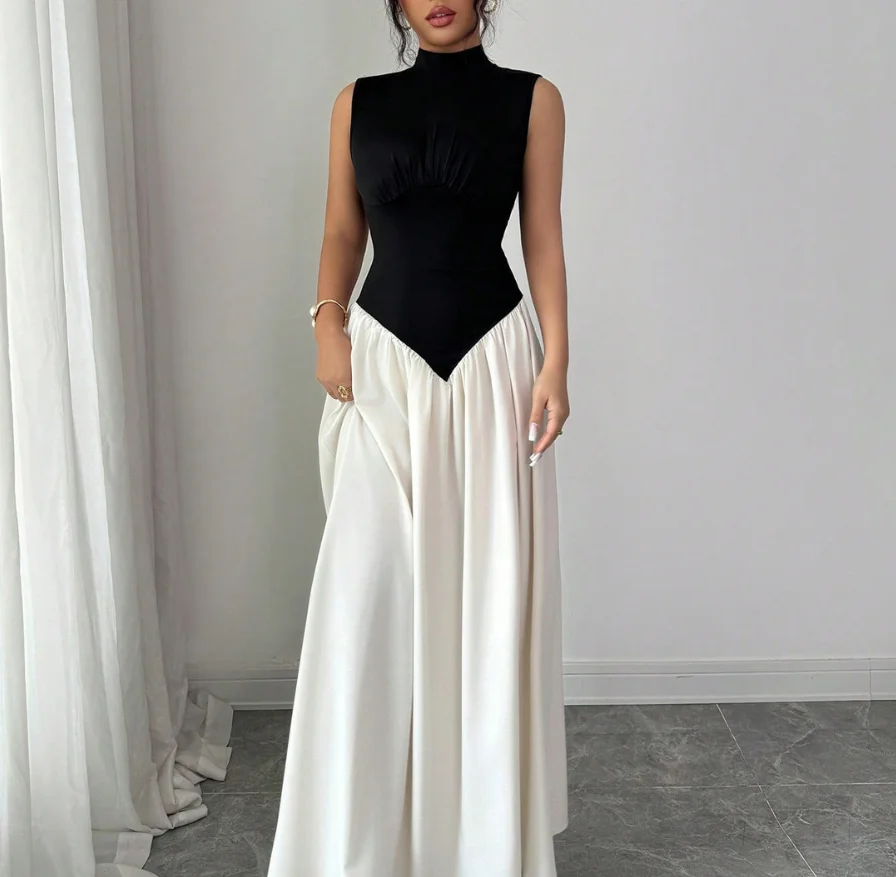 Women Dress 2026 Spring New Black and White Contrast Half High Collar Sleeveless Waist Cinched Elegant Long Dress
Women Dress 2026 Spring New Black and White Contrast Half High Collar Sleeveless Waist Cinched Elegant Long Dress