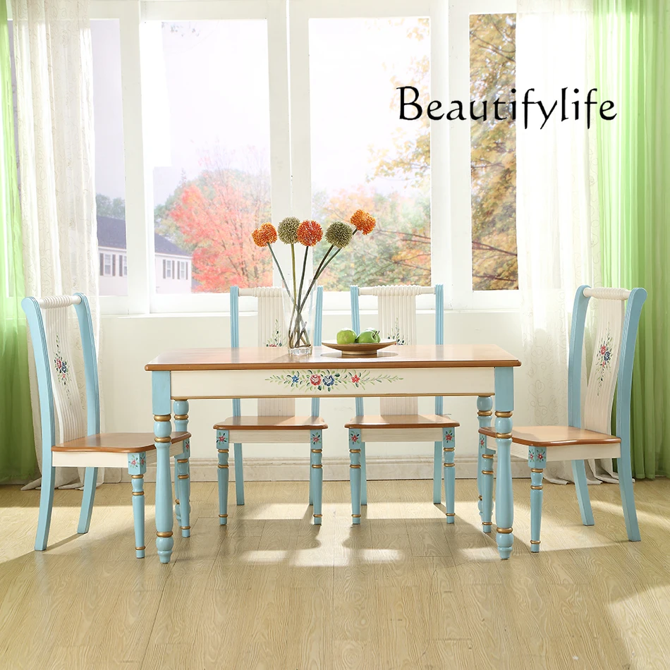 Mediterranean style European and American dining table and chair combination solid wood dining table simple painted dining table
Mediterranean style European and American dining table and chair combination solid wood dining table simple painted dining table