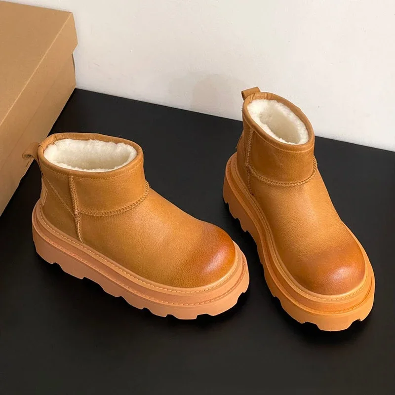 Autumn Winter Vintage Wool Leather Integrated Snow Boots Niche Genuine Leather Round Toe Thick Sole, One Foot Cotton Boots
Autumn Winter Vintage Wool Leather Integrated Snow Boots Niche Genuine Leather Round Toe Thick Sole, One Foot Cotton Boots