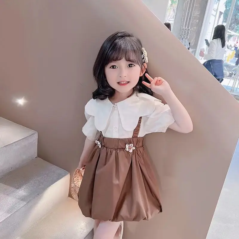 Girls summer two-piece fashion foreign style strap skirt children's skirt 2024 new foreign style girls suit
Girls summer two-piece fashion foreign style strap skirt children's skirt 2024 new foreign style girls suit