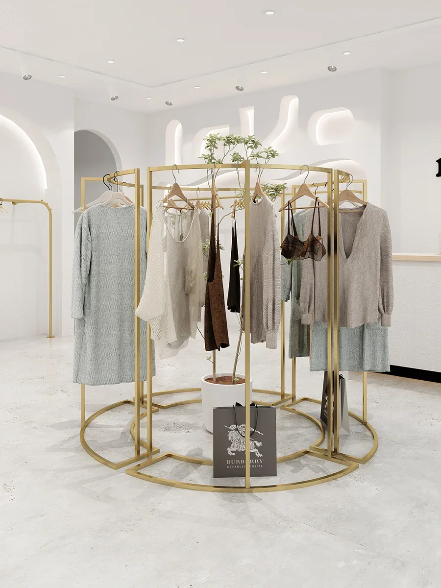 Clothing store display rack Creative Nakajima round shelf display rack Women's store High and low clothes rack in the middle
Clothing store display rack Creative Nakajima round shelf display rack Women's store High and low clothes rack in the middle