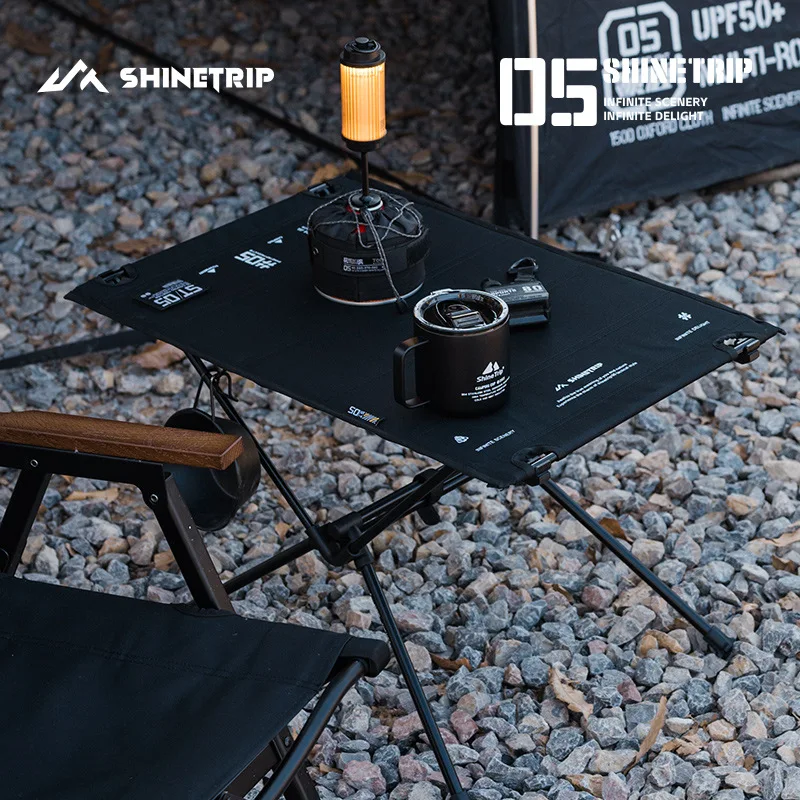 ShineTrip Outdoor Lightweight Cloth Camping Table1000D Polyester Oxford Tactical Wind Aluminum Alloy Stand Camping Table 
ShineTrip Outdoor Lightweight Cloth Camping Table1000D Polyester Oxford Tactical Wind Aluminum Alloy Stand Camping Table