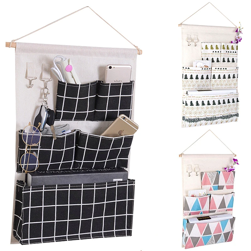 5 Pockets Wall Mounted Bag Waterproof Bedroom Home Storage Hanging Pocket with 2 Hooks Cotton Linen Fabric Sundries Organizer
5 Pockets Wall Mounted Bag Waterproof Bedroom Home Storage Hanging Pocket with 2 Hooks Cotton Linen Fabric Sundries Organizer
