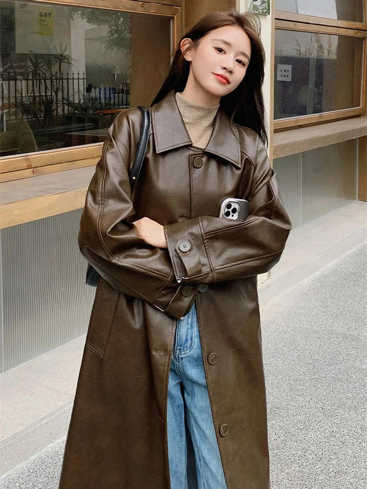 Vintage Leather Long Trench Women Lapel Belt Gathered Waist Single Breasted Windbreaker Fashion New Clothing 2AA4447
Vintage Leather Long Trench Women Lapel Belt Gathered Waist Single Breasted Windbreaker Fashion New Clothing 2AA4447
