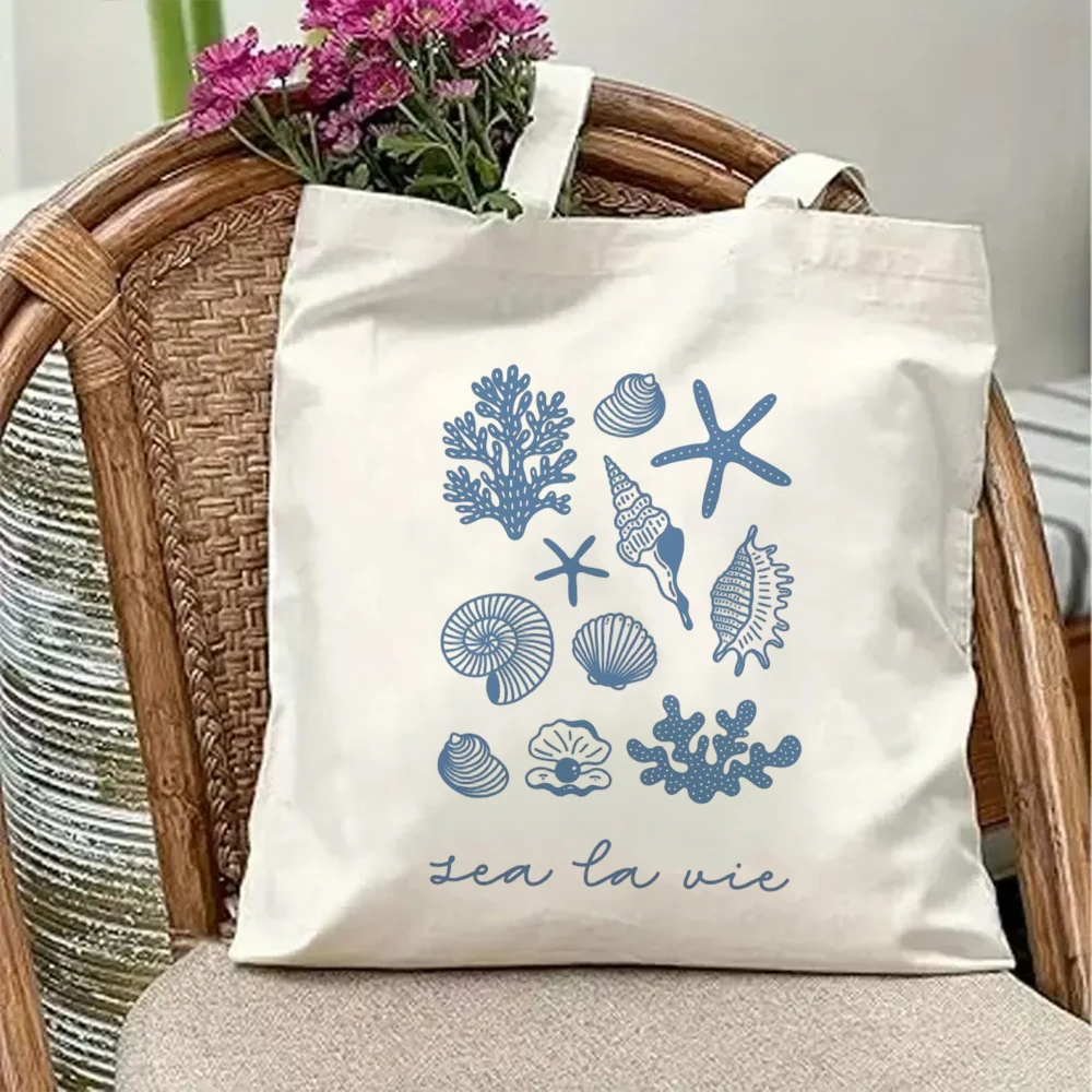 Sea La Vie Canvas Tote Bag Vintage Blue Seashell Starfish Coral Print Aesthetic French Quote Shoulder Purse Beach Bag Gift
Sea La Vie Canvas Tote Bag Vintage Blue Seashell Starfish Coral Print Aesthetic French Quote Shoulder Purse Beach Bag Gift