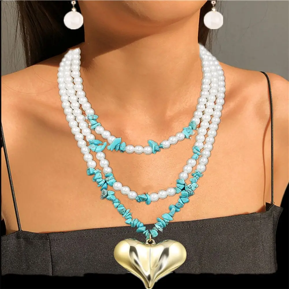 Pearl multi-layer heart pendant necklace fashion exaggerated bohemian gravel necklace jewelry
Pearl multi-layer heart pendant necklace fashion exaggerated bohemian gravel necklace jewelry