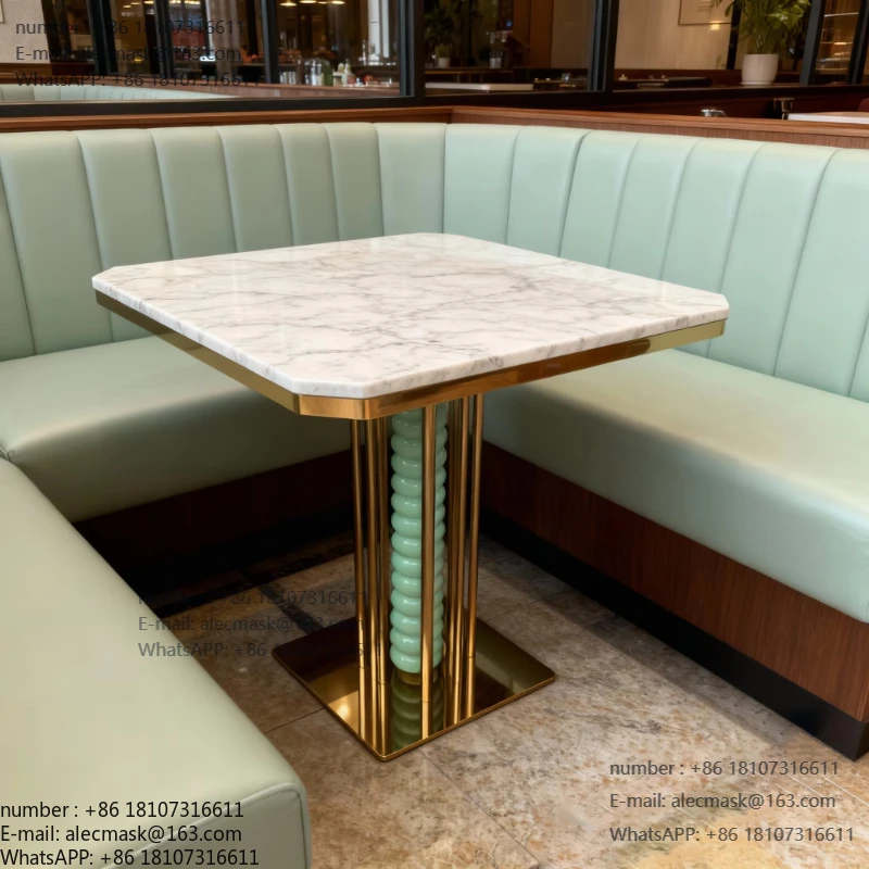 Modern dining table with commercial white marble top and stainless steel frame
Modern dining table with commercial white marble top and stainless steel frame
