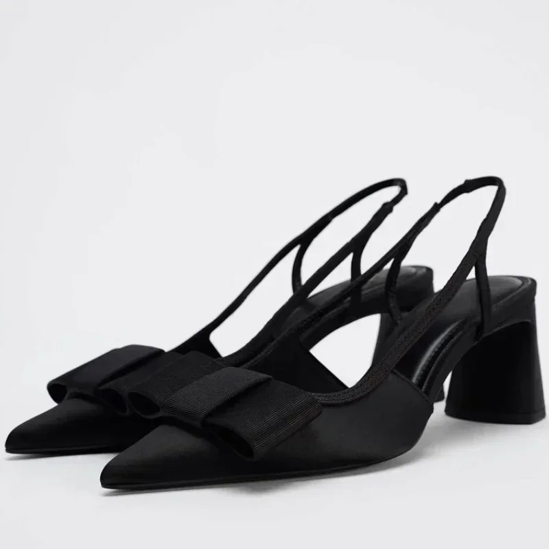 Новые элегантные женские туфли-слингбэки на высоком каблуке с бантом, черные, с острым носком, для вечеринок и офиса
Новые элегантные женские туфли-слингбэки на высоком каблуке с бантом, черные, с острым носком, для вечеринок и офиса