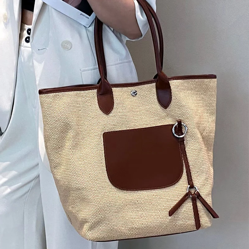 Cowhide Stitching Straw Bag Large Capacity Tote Bag 2025 New Contrast Color Luxury Brand High-end Shoulder Messenger Women Bag
Cowhide Stitching Straw Bag Large Capacity Tote Bag 2025 New Contrast Color Luxury Brand High-end Shoulder Messenger Women Bag