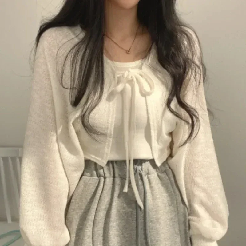 Casual Thin White Cardigan Women Summer Sunscreen Lace-up Knitwear Tops Lady Korean Style Lantern Sleeve Short Sun Protected Top
Casual Thin White Cardigan Women Summer Sunscreen Lace-up Knitwear Tops Lady Korean Style Lantern Sleeve Short Sun Protected Top