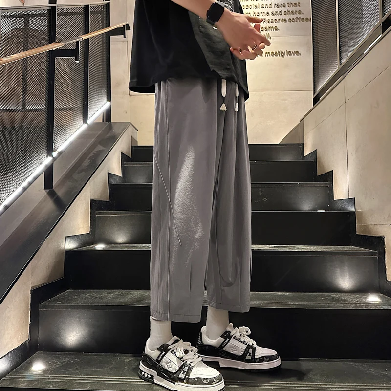 Повседневные летние тонкие свободные мужские брюки из ледяного шелка, длинные брюки с девятью точками Haome, прямые брюки с эластичной резинкой на талии, молодежная мода
Повседневные летние тонкие свободные мужские брюки из ледяного шелка, длинные брюки с девятью точками Haome, прямые брюки с эластичной резинкой на талии, молодежная мода