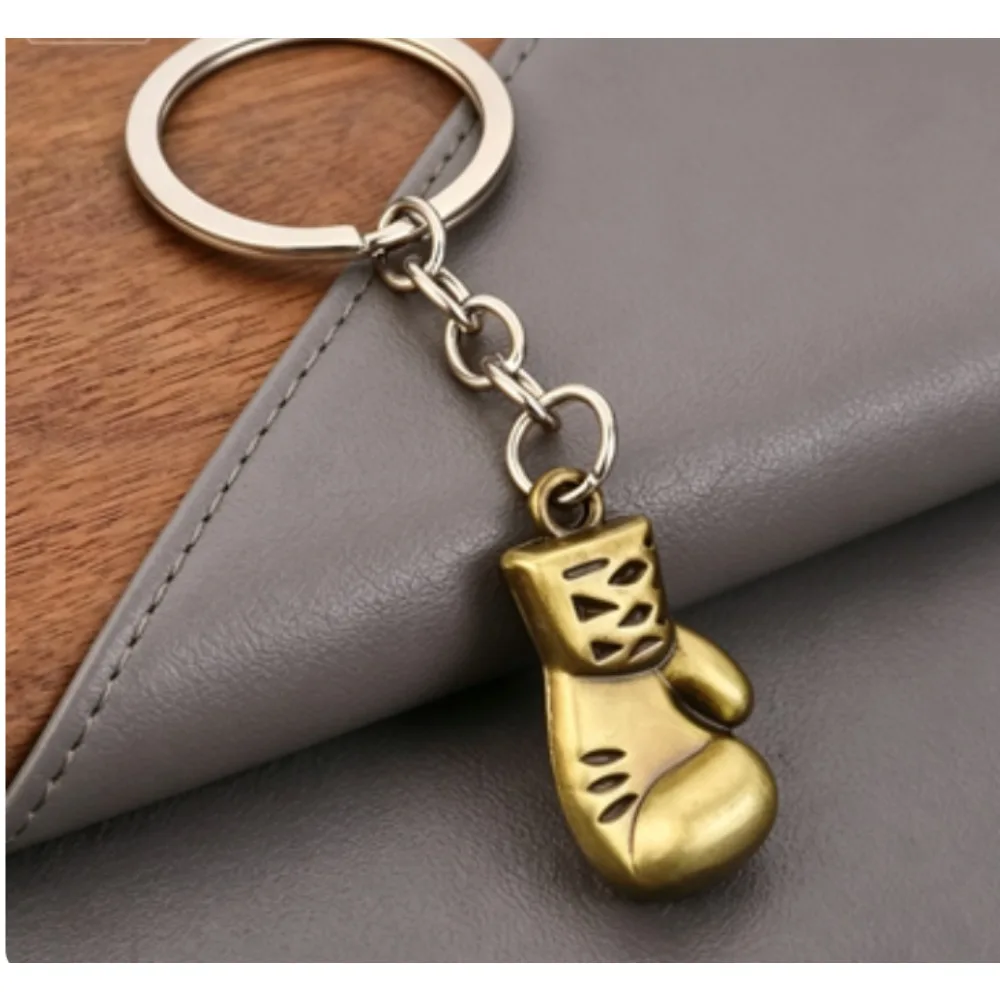 Mini Creative 3D Metal Boxing Gloves Keychain Gym Keyring Pendant or Men Backpack Pendant Car Trinket Fight Club Match Gift
Mini Creative 3D Metal Boxing Gloves Keychain Gym Keyring Pendant or Men Backpack Pendant Car Trinket Fight Club Match Gift