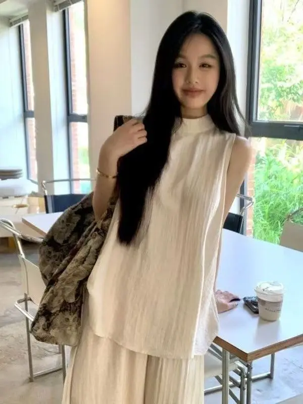 Новый осенний женский повседневный свободный топ без рукавов, широкие брюки с высокой талией, комплект из двух предметов, удобный модный наряд
Новый осенний женский повседневный свободный топ без рукавов, широкие брюки с высокой талией, комплект из двух предметов, удобный модный наряд