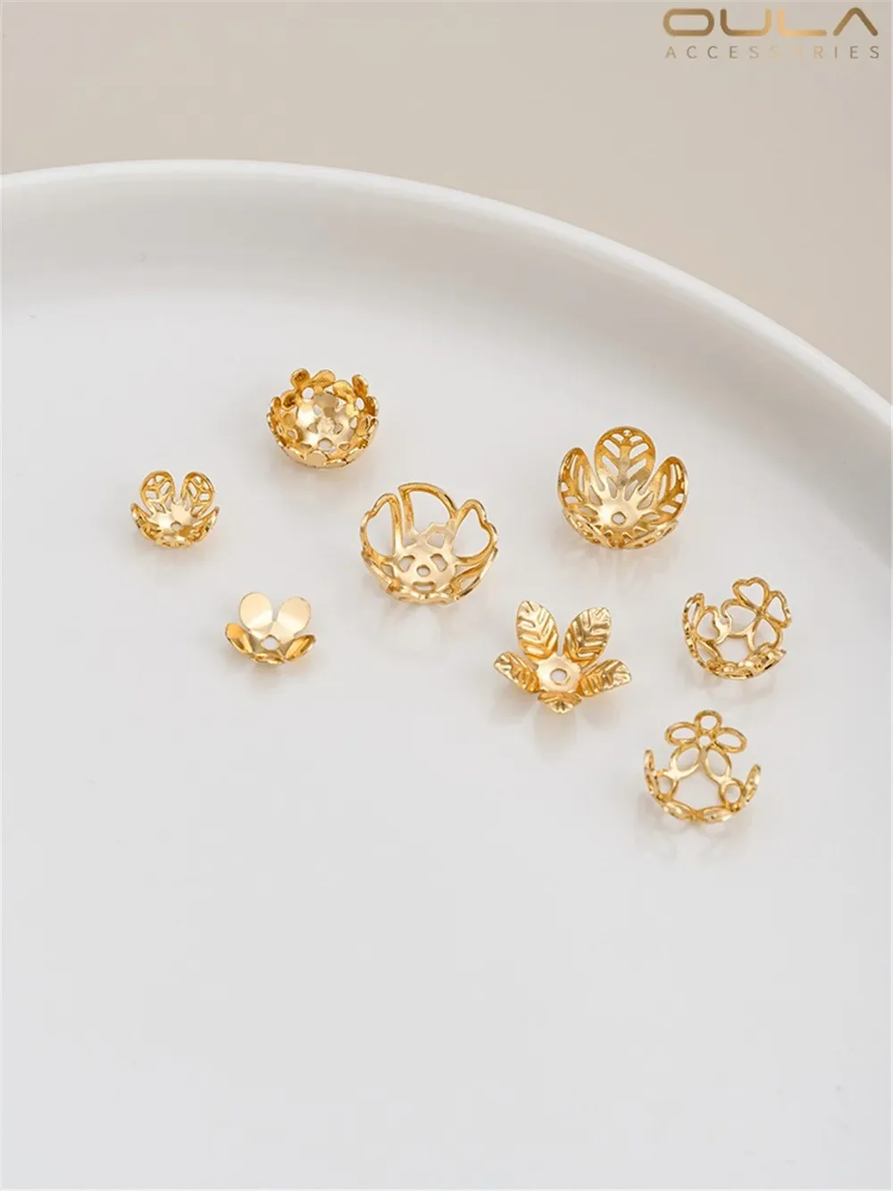 14K Bag Gold Color Hollow Flower Hat Heart-shaped Leaf Plum Bracket Handmade Beaded Bracket Diy Jewelry Accessories
14K Bag Gold Color Hollow Flower Hat Heart-shaped Leaf Plum Bracket Handmade Beaded Bracket Diy Jewelry Accessories