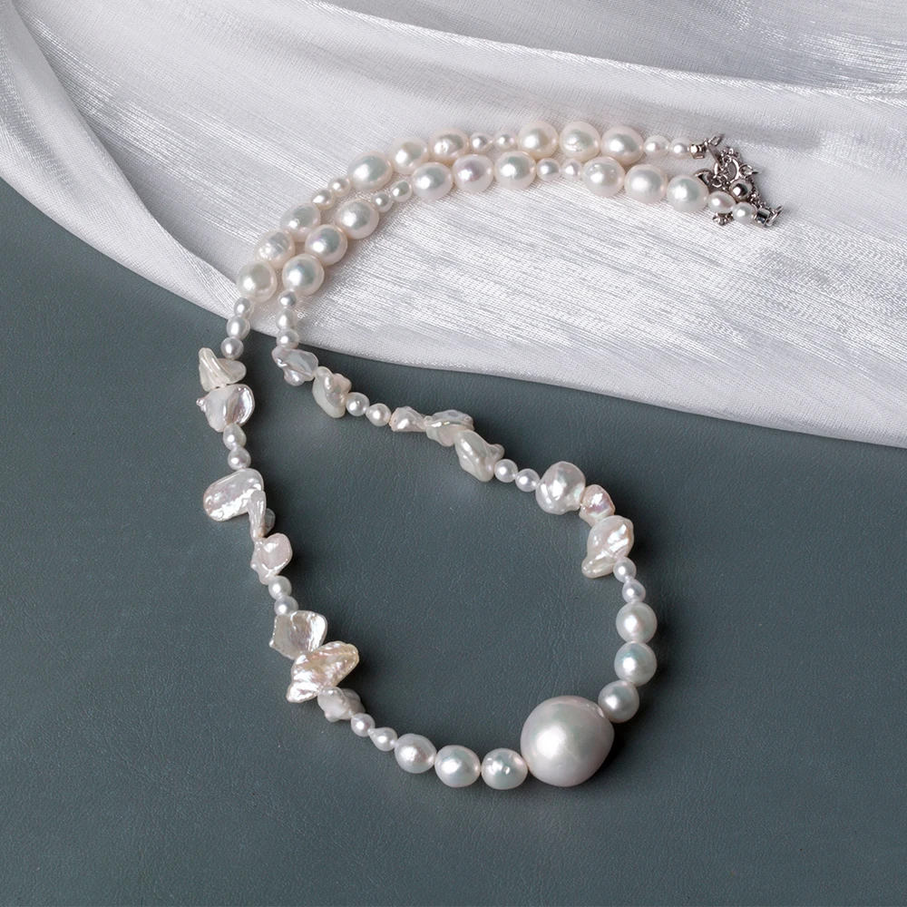 Текстурированная нить в стиле барокко — натуральный пресноводный жемчуг смешанного размера, 17 дюймов, смешанный вид жемчуга PN074
Текстурированная нить в стиле барокко — натуральный пресноводный жемчуг смешанного размера, 17 дюймов, смешанный вид жемчуга PN074