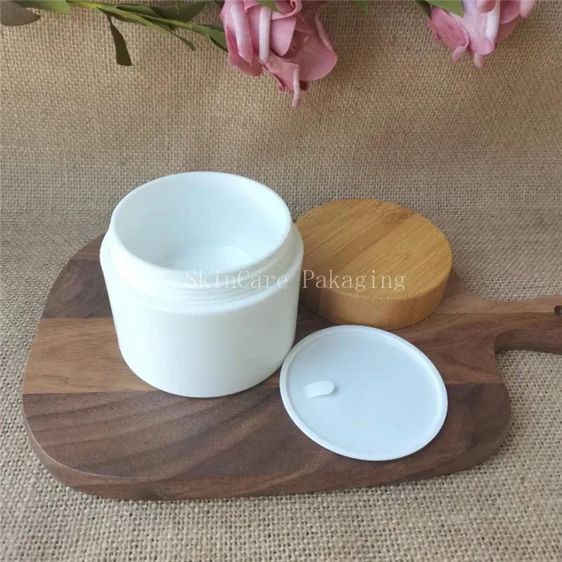 White Thick Wall Plastic With Bamboo Cap Box Makeup Face Cream Lotion Container, Luxury Cosmetic Cream Jar With Bamboo Lid
White Thick Wall Plastic With Bamboo Cap Box Makeup Face Cream Lotion Container, Luxury Cosmetic Cream Jar With Bamboo Lid