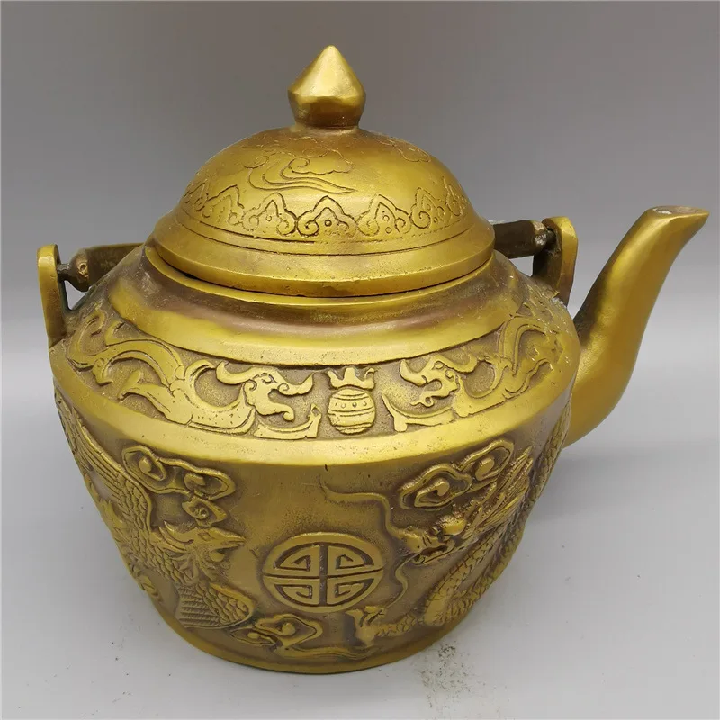Antique-style handicraft collection: vintage brass dragon and phoenix teapot, living room decoration, street market supply
Antique-style handicraft collection: vintage brass dragon and phoenix teapot, living room decoration, street market supply