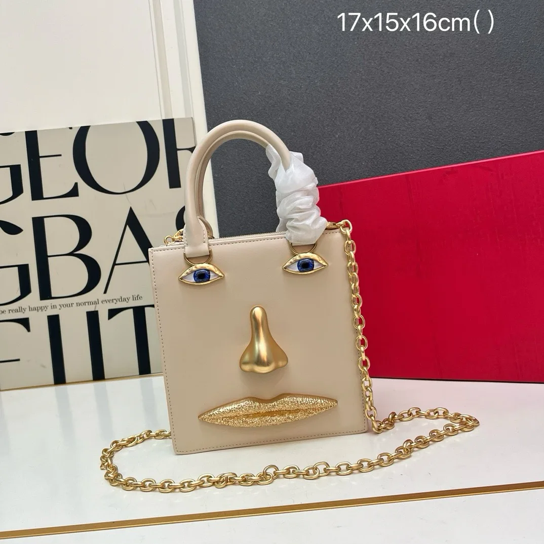 Spring and Summer New Women's Genuine Cowhide Shoulder Crossbody Handbag with Face Design and Pebbled Texture Small Tote Bag
Spring and Summer New Women's Genuine Cowhide Shoulder Crossbody Handbag with Face Design and Pebbled Texture Small Tote Bag