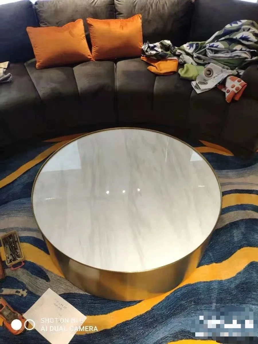 Nordic light luxury round tea table modern simple stainless steel marble design sense of small house tea table
Nordic light luxury round tea table modern simple stainless steel marble design sense of small house tea table