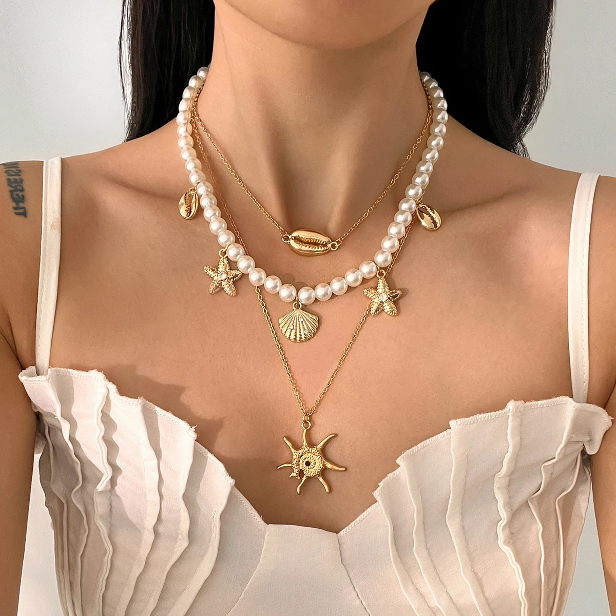 Boho Layered Pearl Shell Starfish Pendant Necklace for Women Beach Style Sun Charm Statement Jewelry Summer Holiday Accessories
Boho Layered Pearl Shell Starfish Pendant Necklace for Women Beach Style Sun Charm Statement Jewelry Summer Holiday Accessories