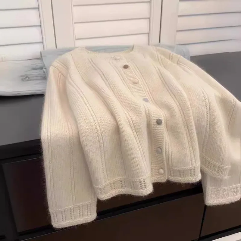 Women Knitted Sweater Twisted Hollow Autumn Winter Chic Loose Long Sleeve Cardigan Tops Vintage Solid Sweater Jacket French
Women Knitted Sweater Twisted Hollow Autumn Winter Chic Loose Long Sleeve Cardigan Tops Vintage Solid Sweater Jacket French