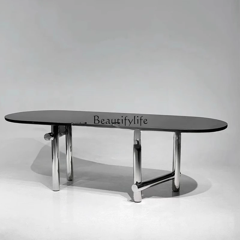 Simple modern black matte rock slab dining table creative stainless steel light luxury oval negotiation table
Simple modern black matte rock slab dining table creative stainless steel light luxury oval negotiation table