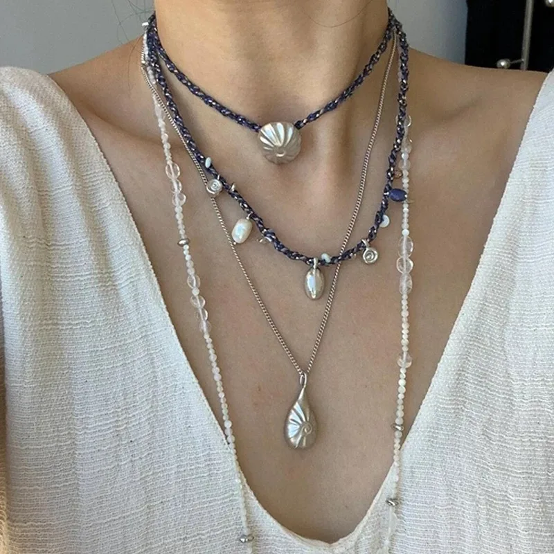 Fashion Pleated Shell Retro Braided Rope Necklace Niche Design Freshwater Pearl Vacation Wind Stacked Collarbone Chain
Fashion Pleated Shell Retro Braided Rope Necklace Niche Design Freshwater Pearl Vacation Wind Stacked Collarbone Chain