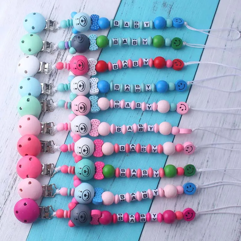 5pcs/lot Cute Cartoon Baby Pacifier Clips Mixed Color Wooden Teething Beads Nipple Holder for Baby Boys Girls Soother Clips
5pcs/lot Cute Cartoon Baby Pacifier Clips Mixed Color Wooden Teething Beads Nipple Holder for Baby Boys Girls Soother Clips