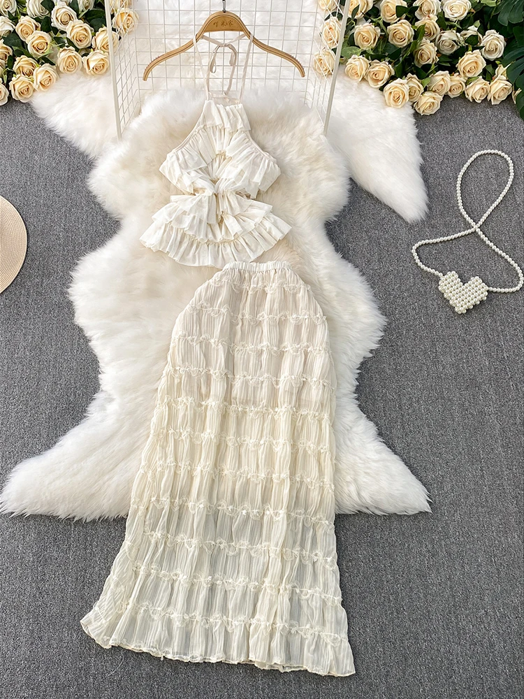 Vacation style design ruffled edges waist cinching and slimming hem neck hanging suspender set mesh pleated high waisted skirt
Vacation style design ruffled edges waist cinching and slimming hem neck hanging suspender set mesh pleated high waisted skirt