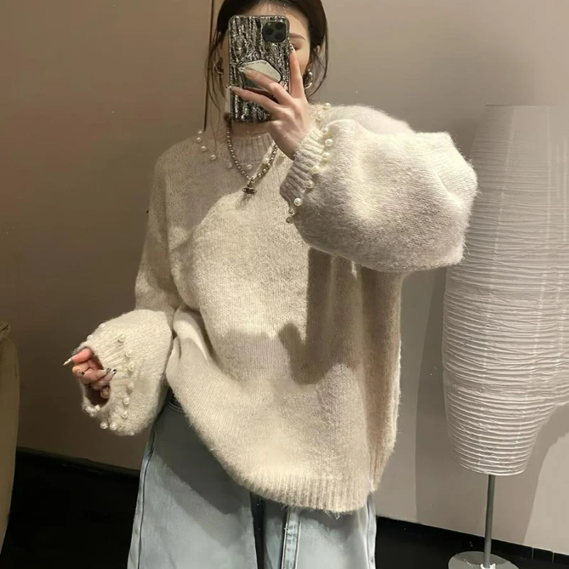 Джемперы женские, пуловеры с круглым вырезом, свитер с жемчугом, свободные вязаные однотонные свитера с длинными рукавами, уличная одежда, осень 2025 г.
Джемперы женские, пуловеры с круглым вырезом, свитер с жемчугом, свободные вязаные однотонные свитера с длинными рукавами, уличная одежда, осень 2025 г.