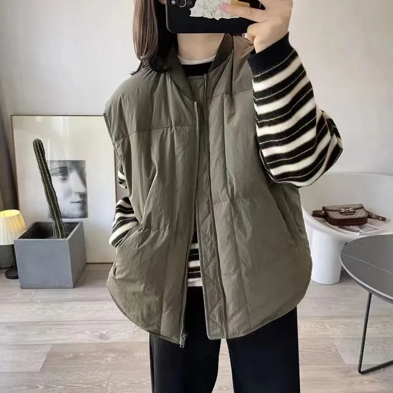 Women's Jacket Stand-up Collar Baseball Uniform Down Vest Female Autumn and Winter new Loose Fashion Down Jacket Vest Coat Tide
Women's Jacket Stand-up Collar Baseball Uniform Down Vest Female Autumn and Winter new Loose Fashion Down Jacket Vest Coat Tide