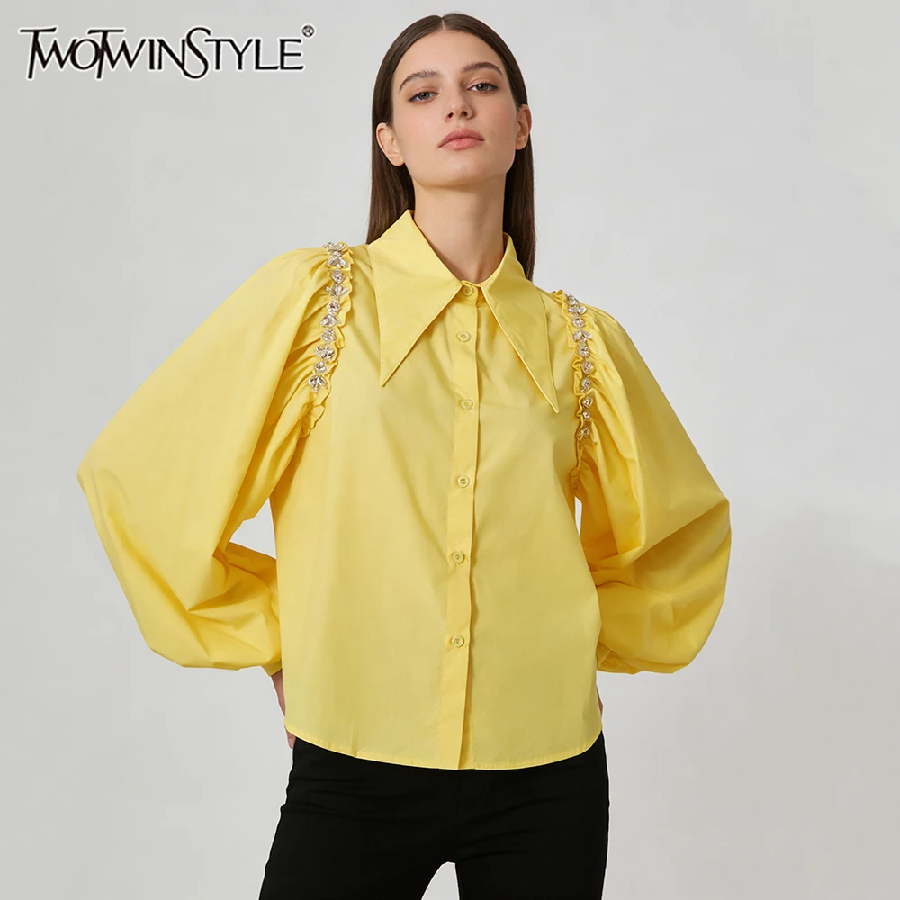 TWOTWINSTYLE Solid Loose Spliced Bead Casual Shirts for Women Lapel Long Sleeves Patchwork Shirring Fashion Shirt Female Clothes
TWOTWINSTYLE Solid Loose Spliced Bead Casual Shirts for Women Lapel Long Sleeves Patchwork Shirring Fashion Shirt Female Clothes