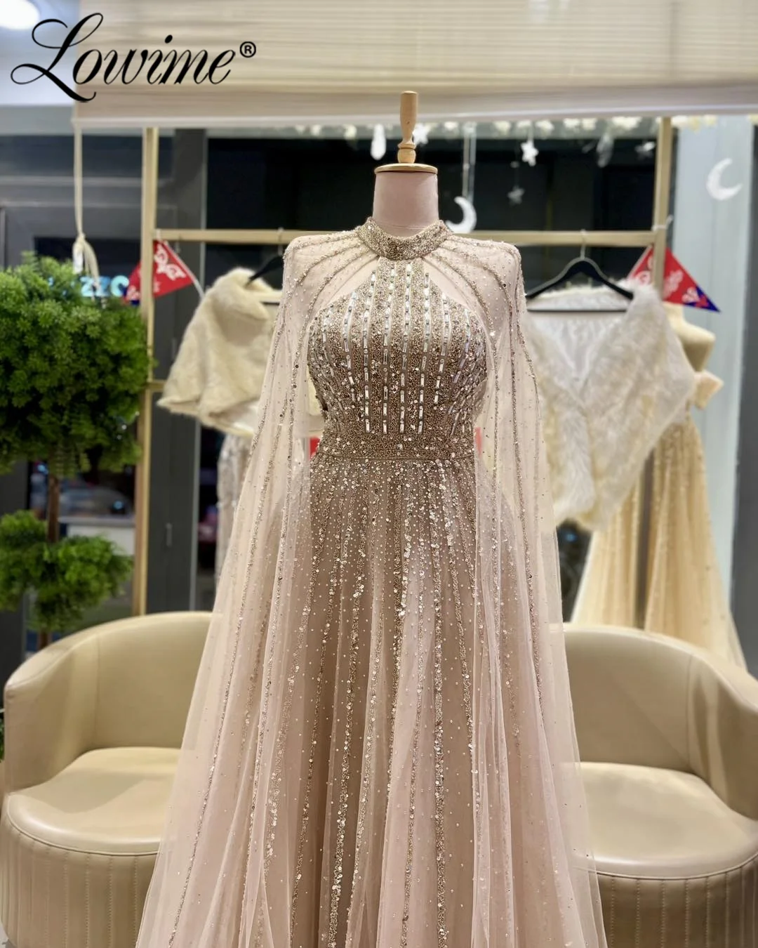 Elegant Crystals Beaded Champagne Evening Dress 2026 Customized A Line Cape Sleeve Party Gowns Long Saudi Arabia Prom Dresses
Elegant Crystals Beaded Champagne Evening Dress 2026 Customized A Line Cape Sleeve Party Gowns Long Saudi Arabia Prom Dresses