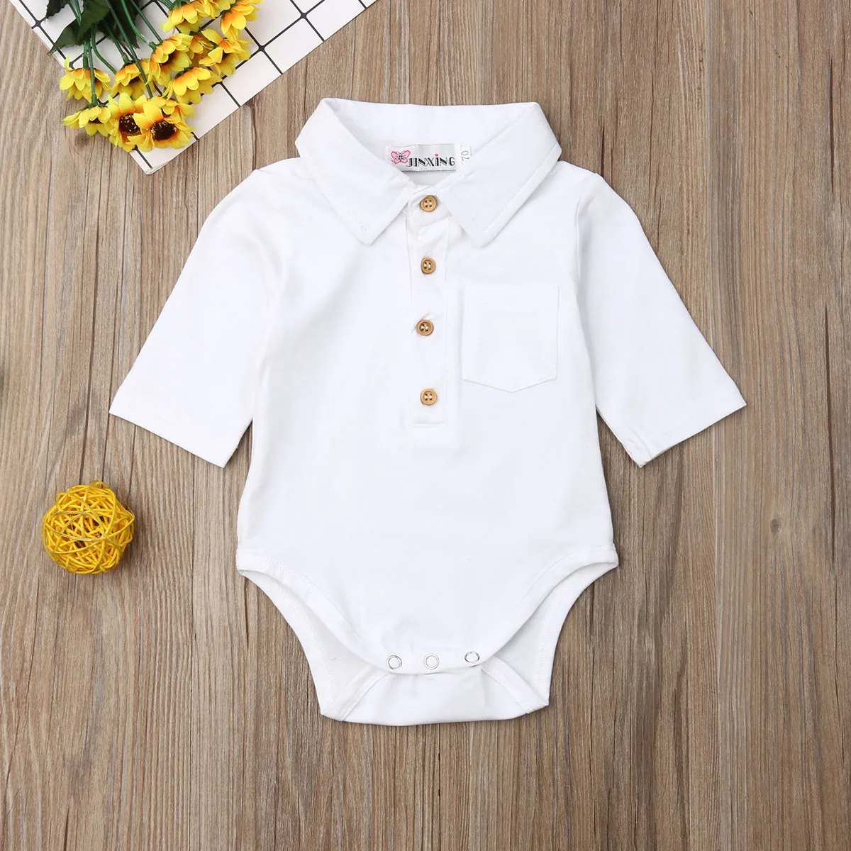 Infant Boy Short Sleeve Romper with Button Closure and Solid Color Design for Stylish and Comfortable Wear
Infant Boy Short Sleeve Romper with Button Closure and Solid Color Design for Stylish and Comfortable Wear