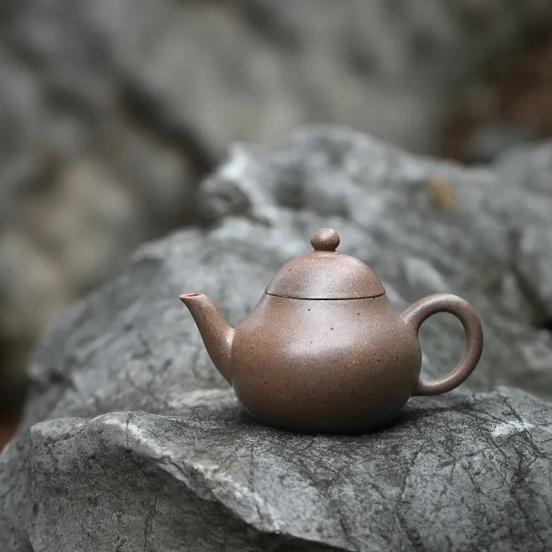 Zanghutianxia Yixing Purple Clay Teapot Handmade Kung Fu Tea Set Early Laoqing Plaster Small Capacity Handmade Teapot Pear-Shape
Zanghutianxia Yixing Purple Clay Teapot Handmade Kung Fu Tea Set Early Laoqing Plaster Small Capacity Handmade Teapot Pear-Shape