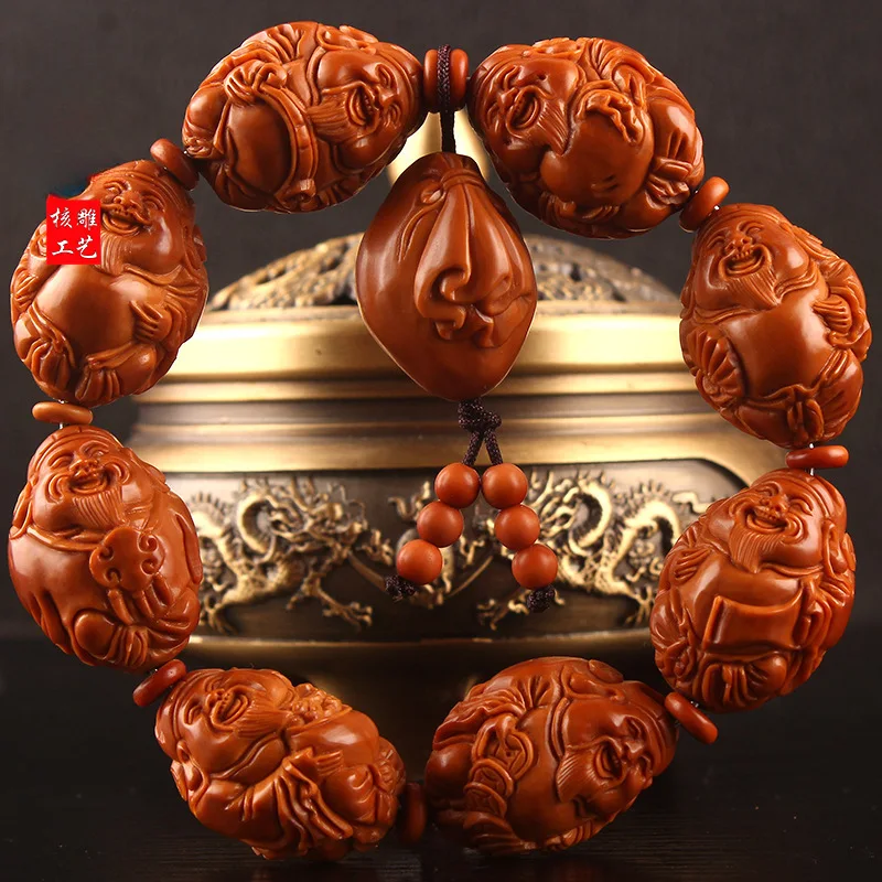 Браслет Eight Gods Carving Wealth God с большим семенами оливкового ямы
Браслет Eight Gods Carving Wealth God с большим семенами оливкового ямы