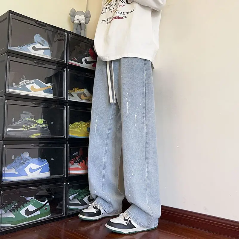 Мужские винтажные джинсы из денима с эффектом потертости, широкие брюки в стиле casual, большие размеры, универсальные длинные брюки для уличного стиля
Мужские винтажные джинсы из денима с эффектом потертости, широкие брюки в стиле casual, большие размеры, универсальные длинные брюки для уличного стиля