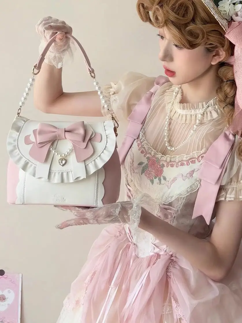 Japanese Original Cla Series Sweet and Elegant Handbag Women's Bow Ruffled Pearl String Lolita Flip Shoulder Messenger Bag Lady
Japanese Original Cla Series Sweet and Elegant Handbag Women's Bow Ruffled Pearl String Lolita Flip Shoulder Messenger Bag Lady