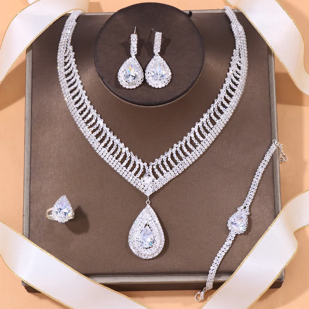 Zircon Water Drop Bride Jewelry Set Women Wedding Accessories Hollow Rhinestone Necklace Earrings Bracelet Ring Dubai Jewelry
Zircon Water Drop Bride Jewelry Set Women Wedding Accessories Hollow Rhinestone Necklace Earrings Bracelet Ring Dubai Jewelry