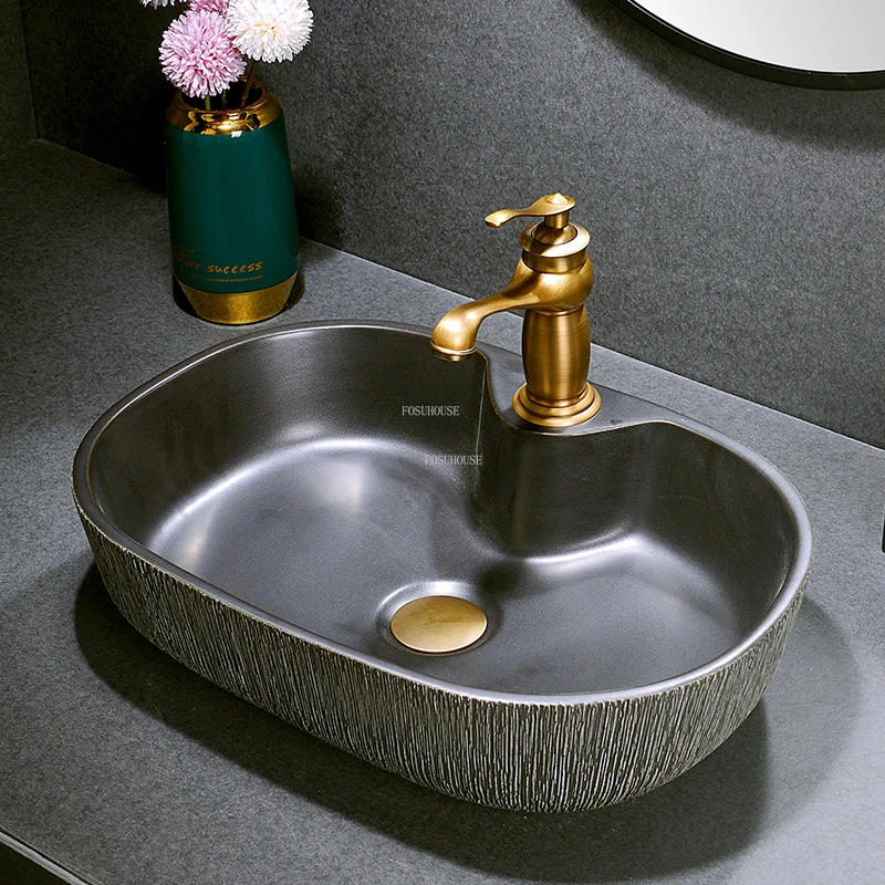 European creative Bathroom Sinks Art Ceramic Countertop Basin Oval Washbasin Balcony Bathroom Basin Household Retro Single Basin
European creative Bathroom Sinks Art Ceramic Countertop Basin Oval Washbasin Balcony Bathroom Basin Household Retro Single Basin