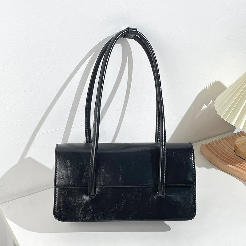 New Niche Solid Color Women's Handheld Shoulder Bag, High-End Texture, Versatile Stylish & Minimalist
New Niche Solid Color Women's Handheld Shoulder Bag, High-End Texture, Versatile Stylish & Minimalist