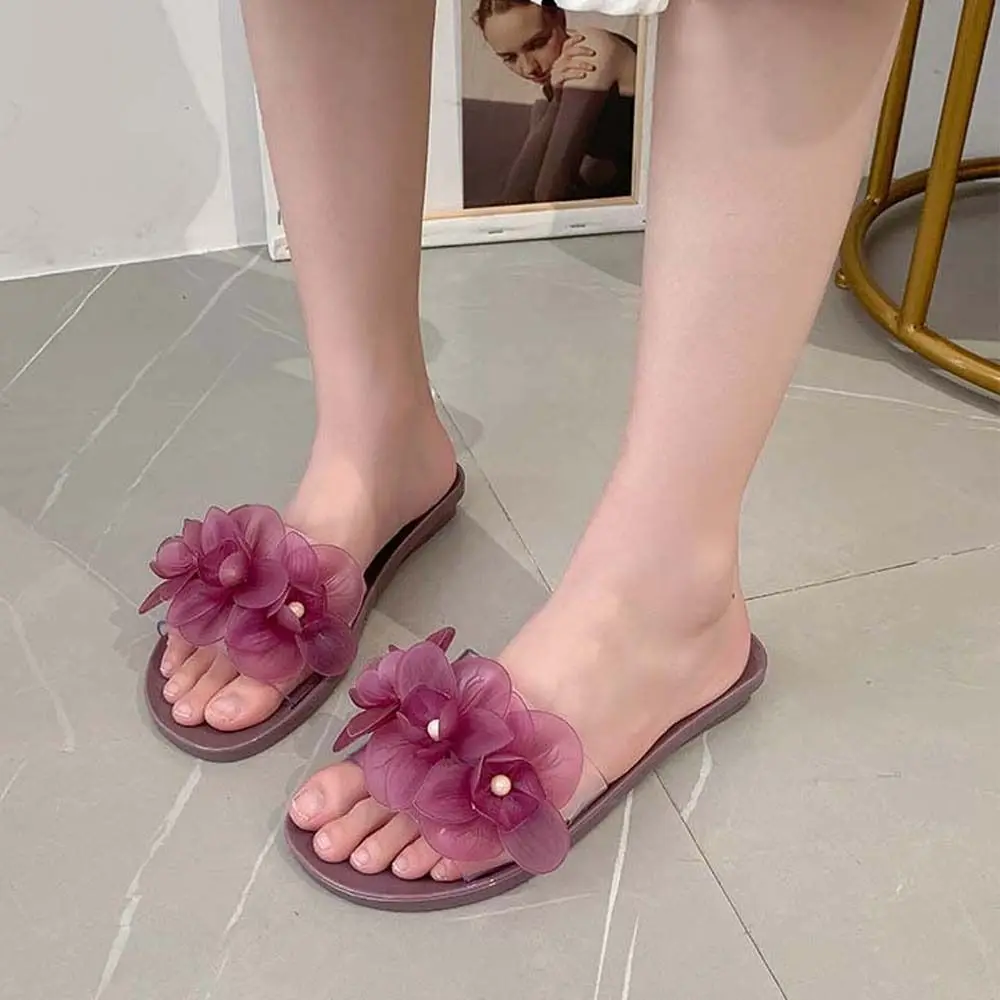Holiday Outer Wear Women Flower Crystal Slippers Pink Purple Jelly Transparent Flower Seaside Sandals Non-Slip Flat Shoes
Holiday Outer Wear Women Flower Crystal Slippers Pink Purple Jelly Transparent Flower Seaside Sandals Non-Slip Flat Shoes
